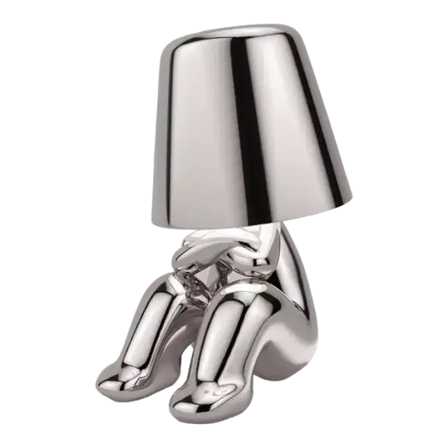 A Shiny And Sad Little Silver Mr Where Man Table Lamp is Sad Because No One Buy Him